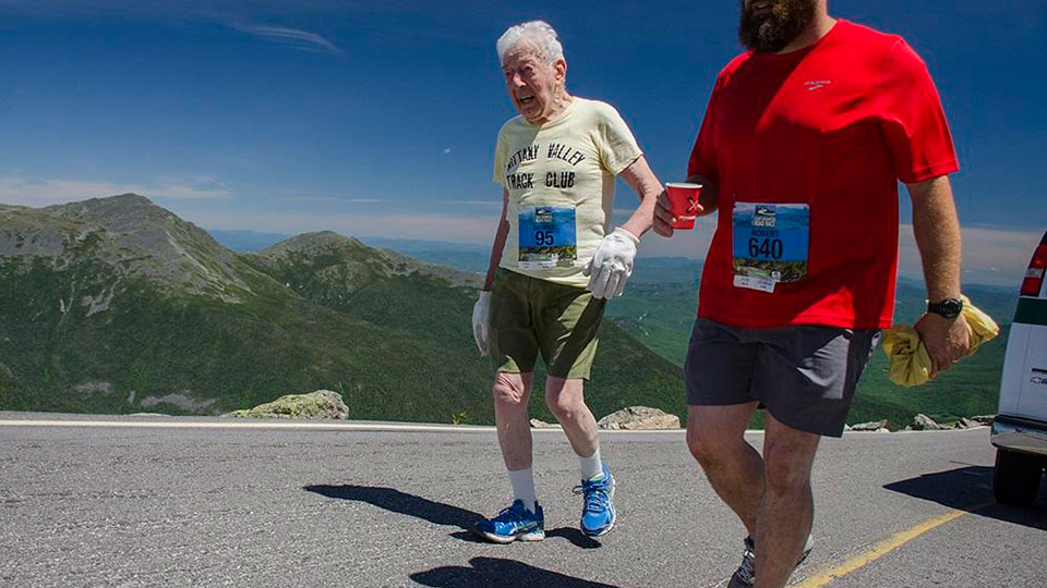 George Etzweiler, left, runs up Mount Washington. Credit Dan Houde / Mount Washington Road