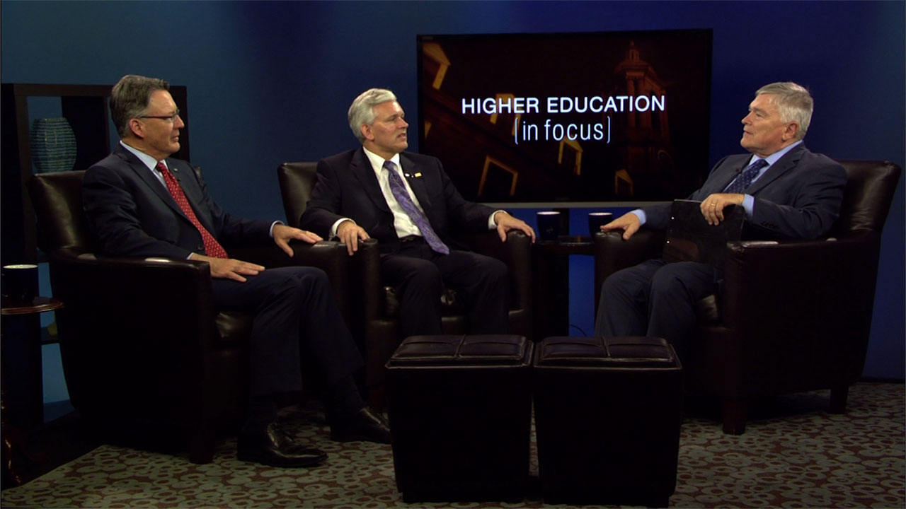 Jonathan Alger and Timothy Sands with Eric Barron on the set of Higher Education in Focus
