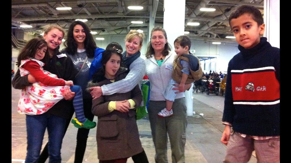 Penny Eifrig (third from right) with refugee kids and other volunteers, including her daughter Saede (second from left).