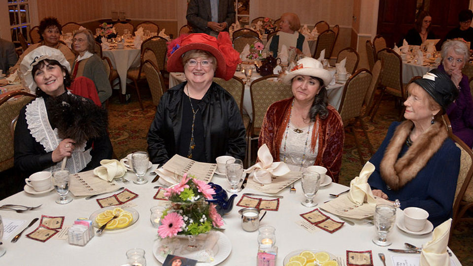 Guests sitting at a table at the WPSU Downton Abbey Farewell Event