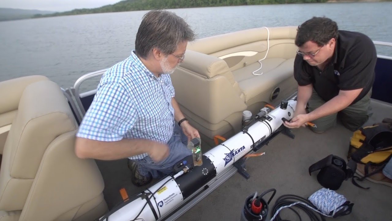 Scientist with self-driving submarine