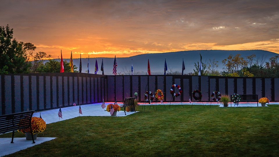 Traveling Vietnam Wall with Mount Nittany in the background at sunset