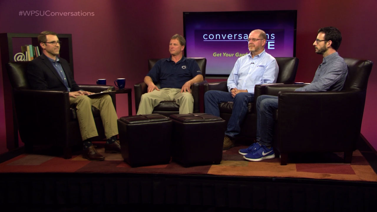 Host Bill Hallman and guests on the set of Conversations Live