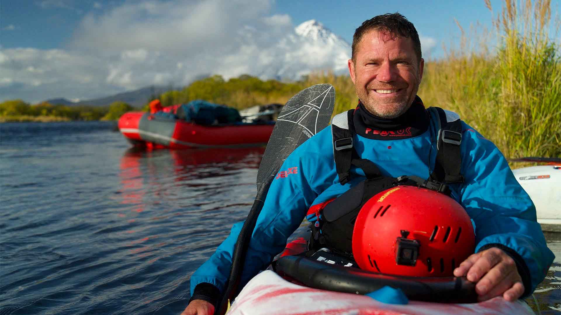 photo of Steve Backshall in a kayak on water