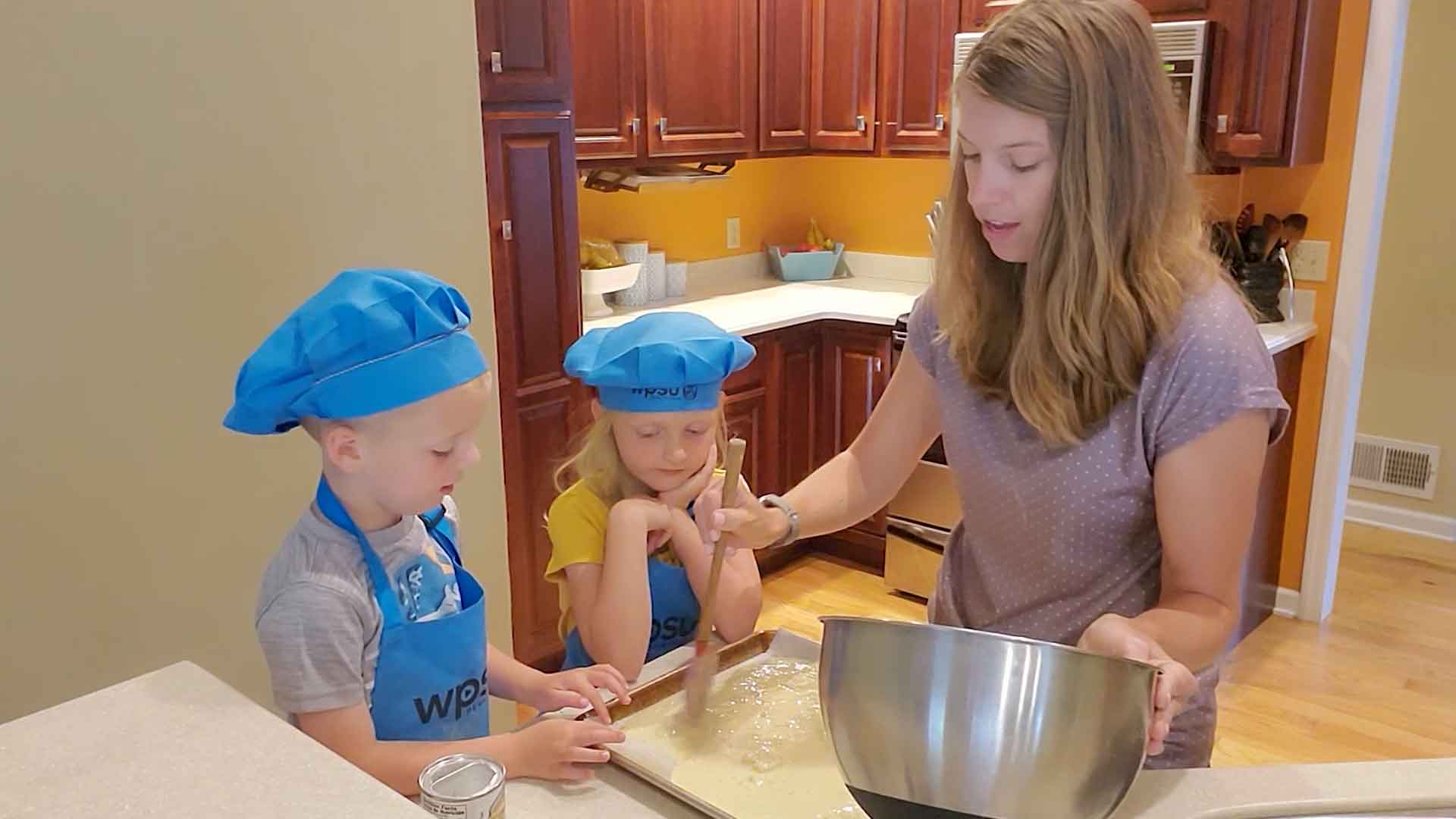 Cassie and kids in the kitchen
