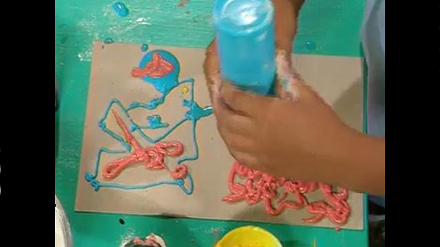 child making a painting