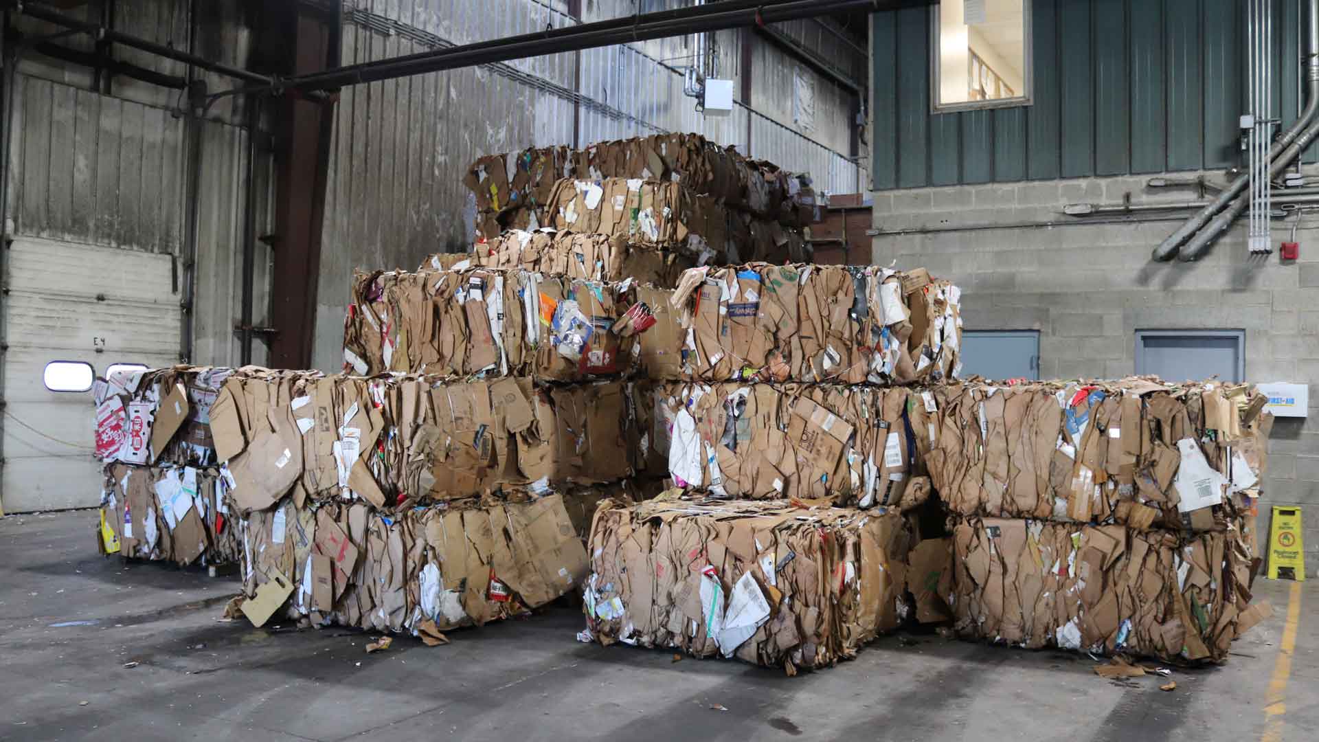 large pile of cardboard bales