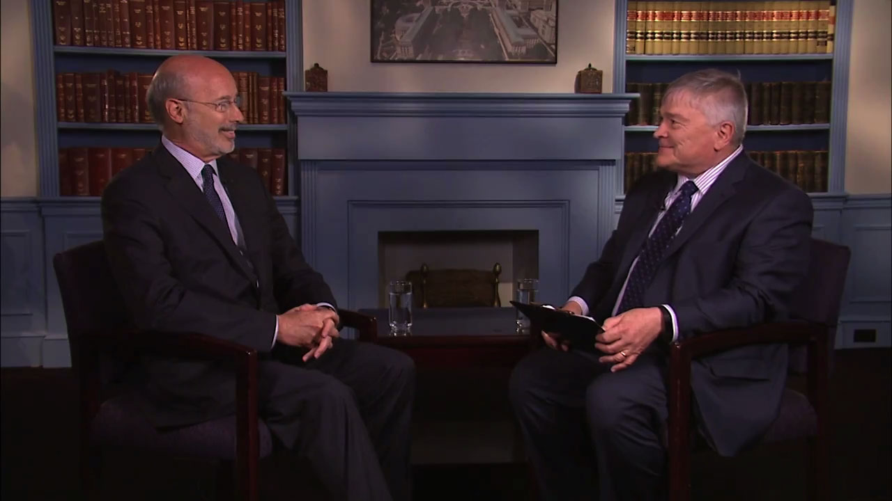 Governor Tom with speaking with Penn State President Eric Barron