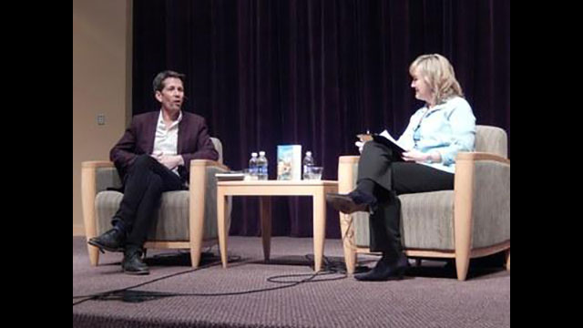 Patty Satalia talks with bestselling author Jess Walter at Penn State's HUB Robeson Center.