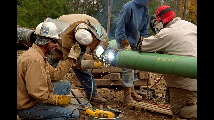 Crews weld a pipeline the Loyalsock State Forest.