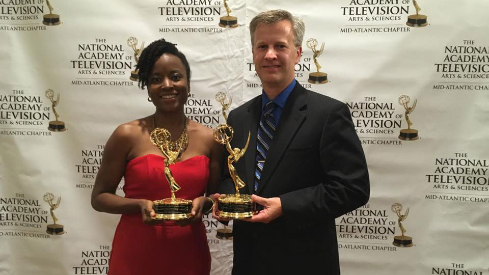 Cheraine Stanford and Cole Cullen pose for a photo holding their 2016 Mid Atlantic Emmy Awards