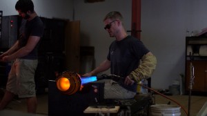 Ben Ahlgrim working with hot glass