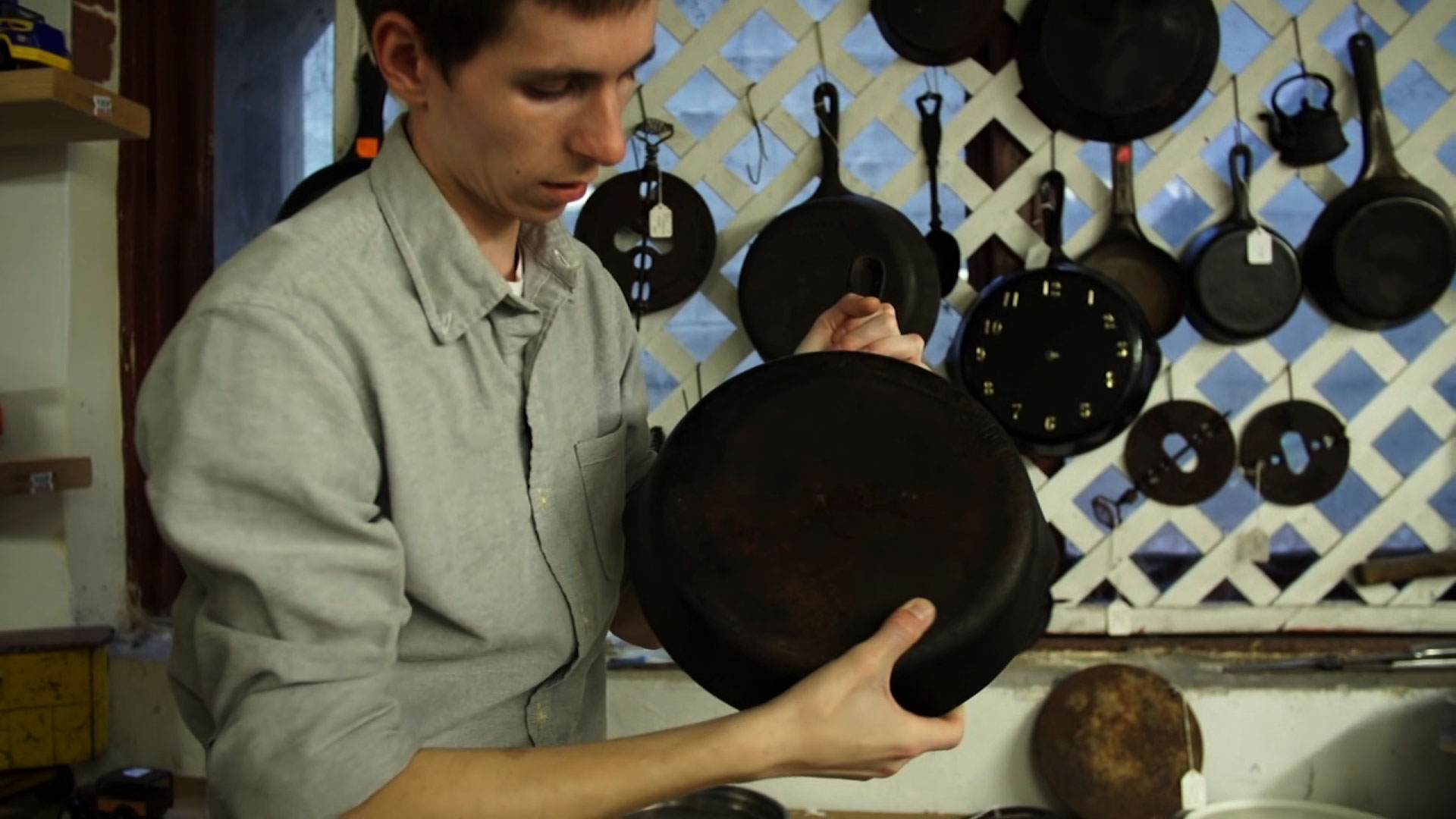 Satchel Mantz holding cast iron pan