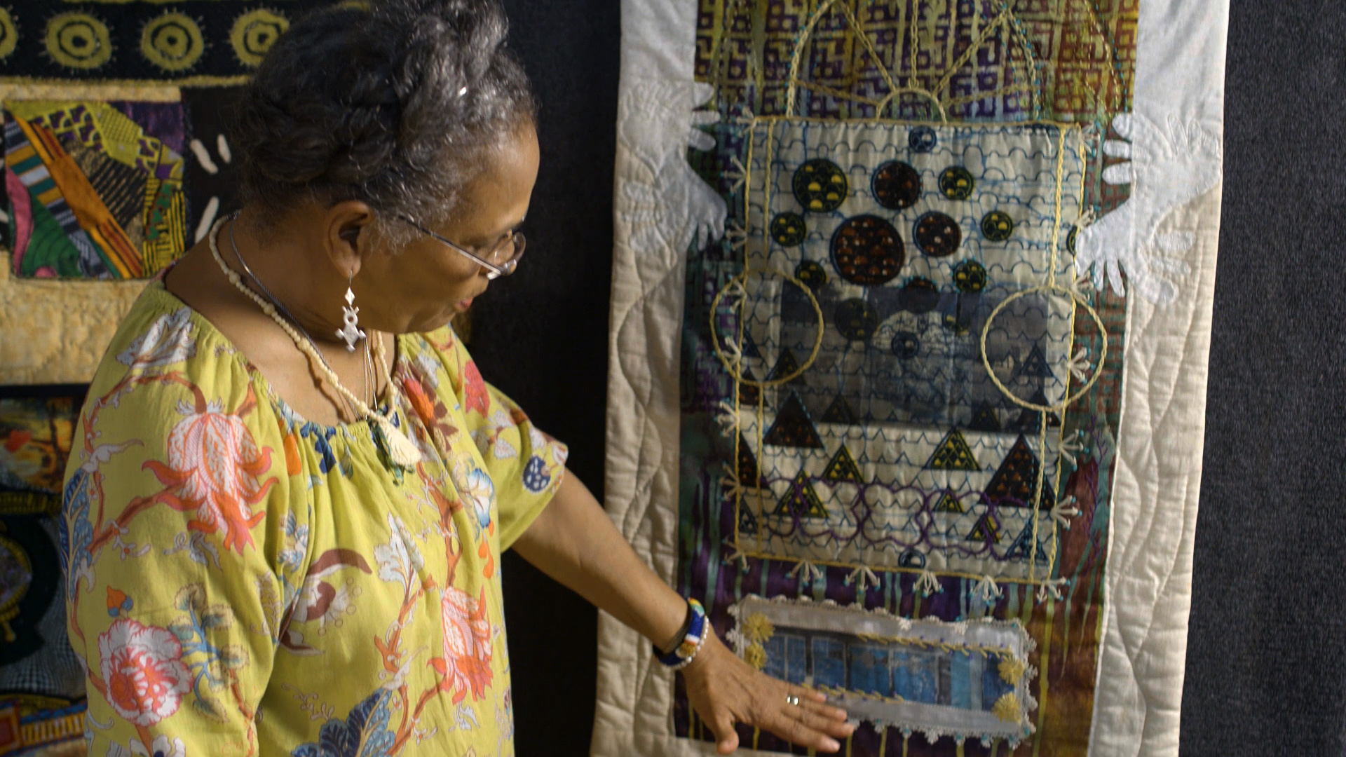 Tina Williams Brewer and her quilt Say It With Iron