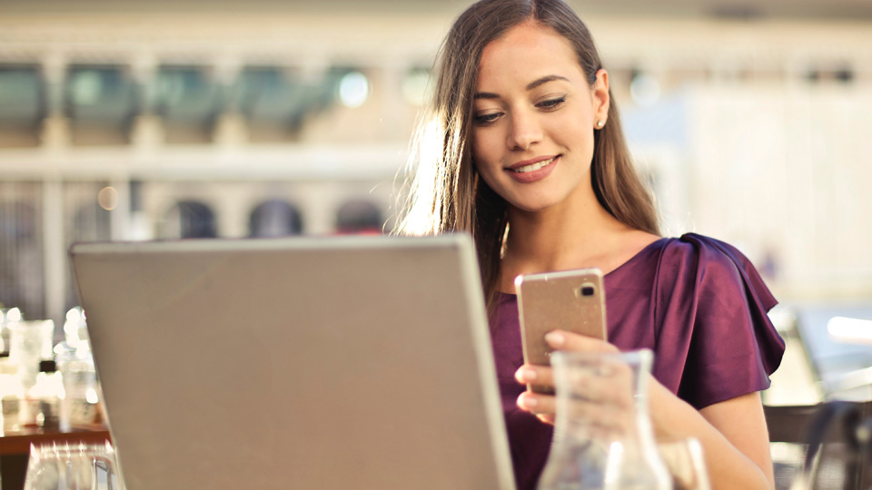 Adult woman looking at smartphone