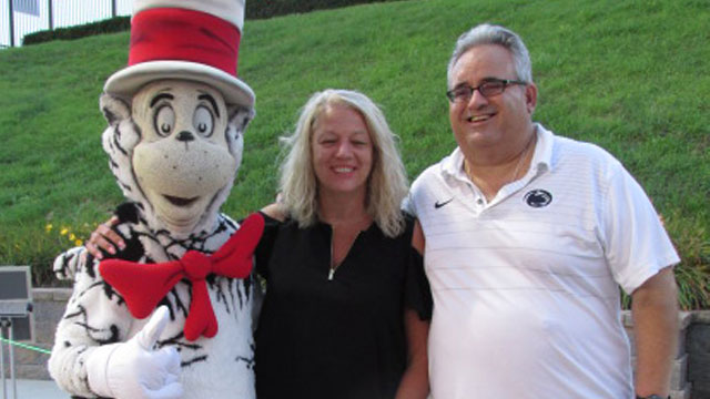 Cat in the Hat posing with guests at the Altoona Curve