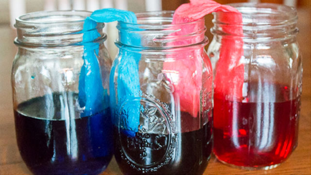 jars with color dyed water