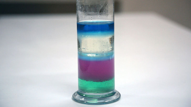 tube of liquid with layers of color