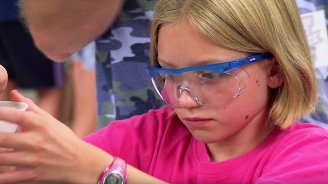 girl wearing safety goggles