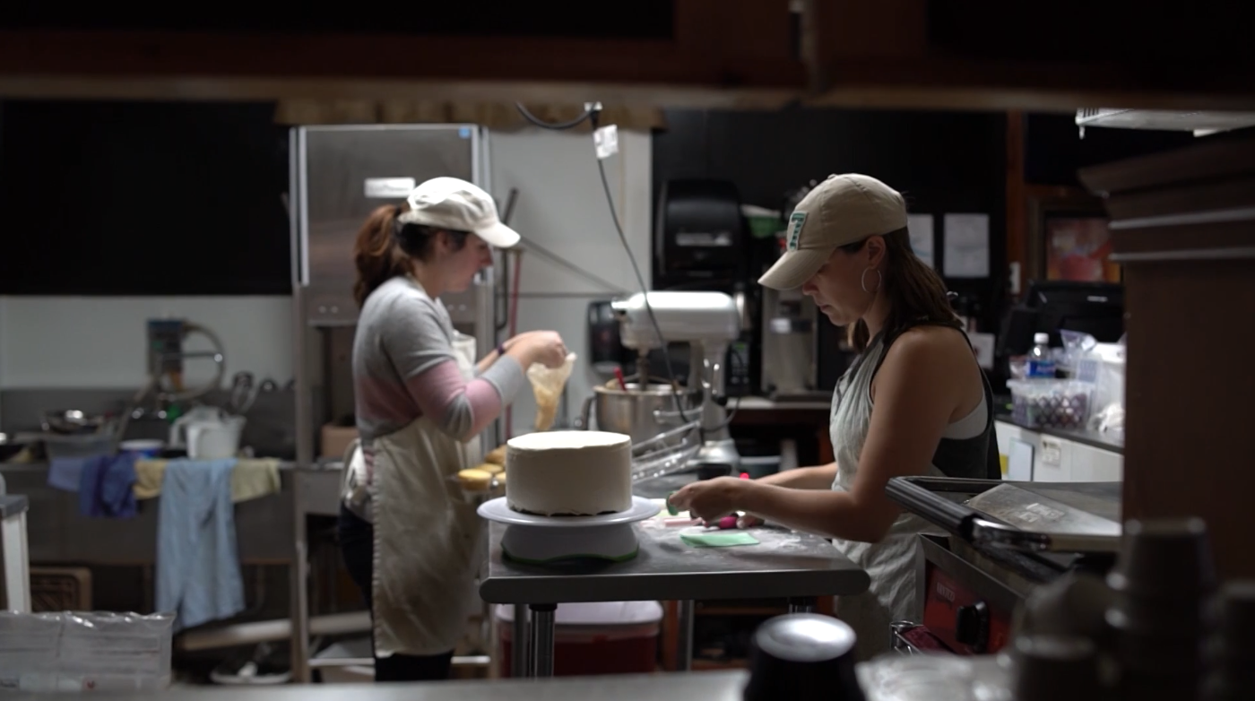 Two women working in a bakery