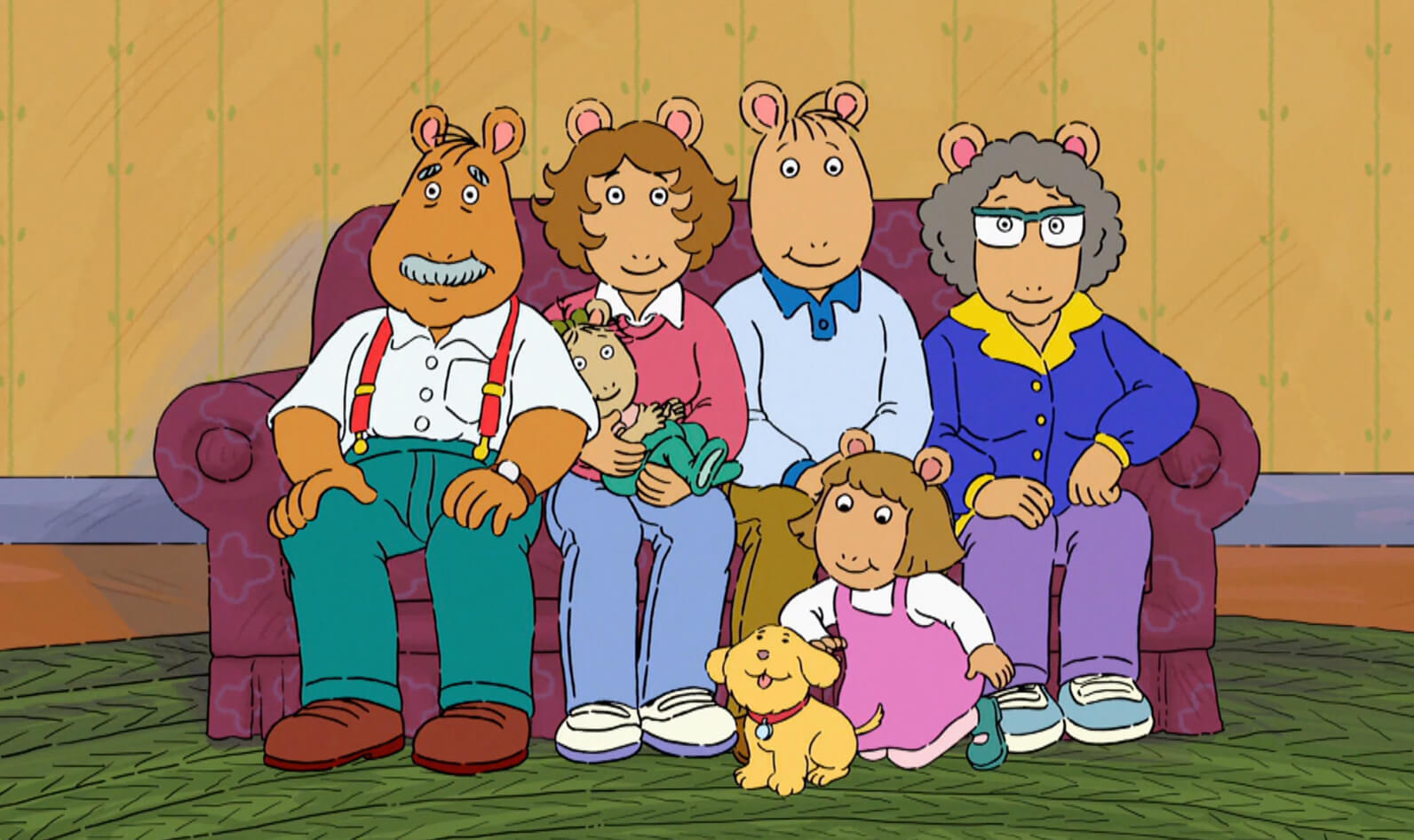 A cartoon family sitting on a couch