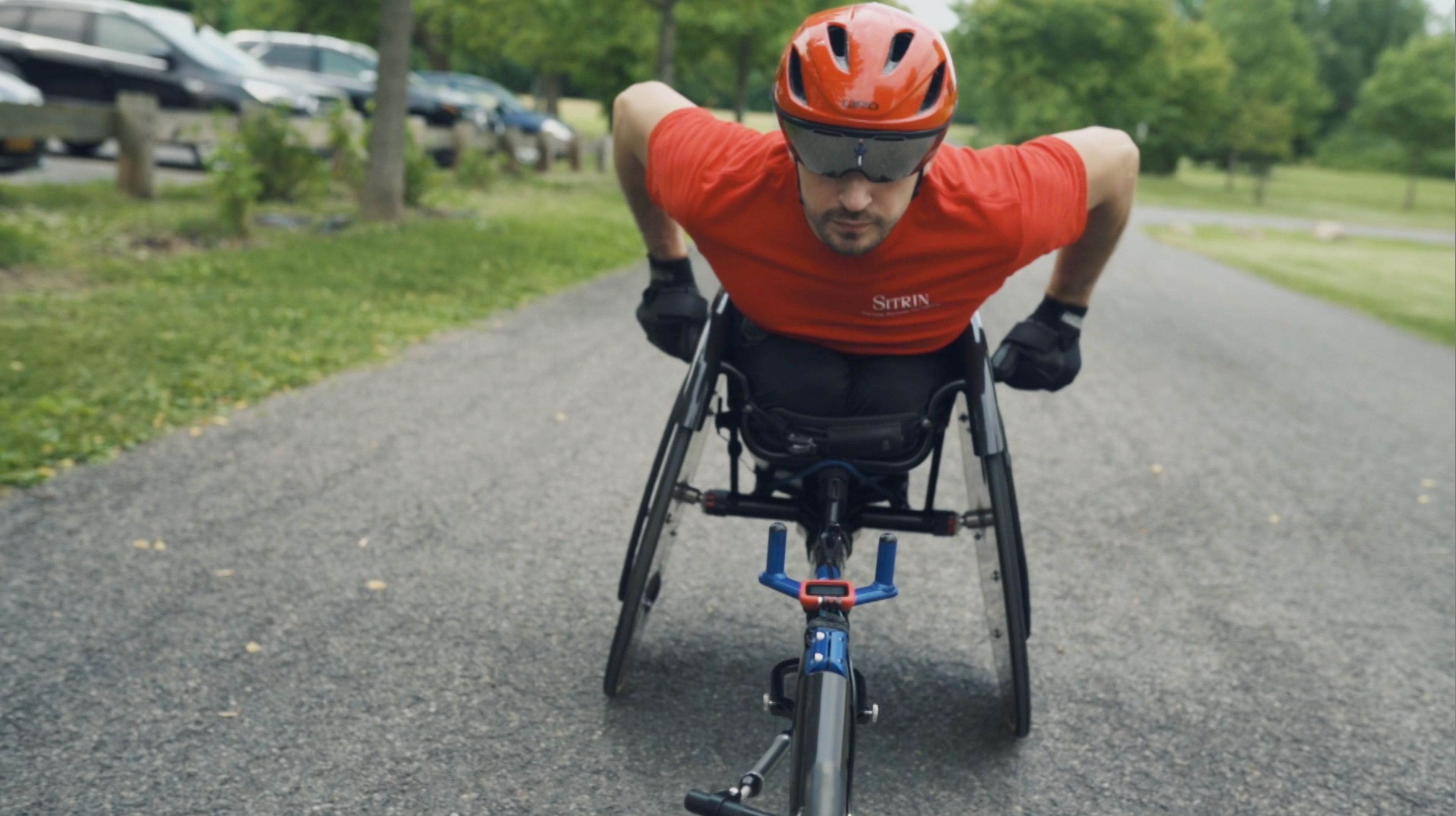 A man on an accessible seated bike.