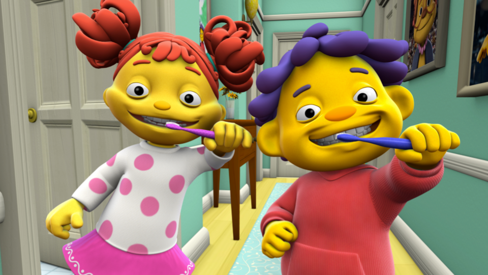 Two CGI children brush their teeth in a hallway.