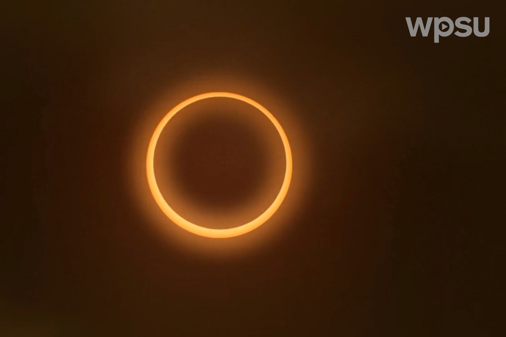 An image of the moon in front of the sun in an annular solar eclipse.