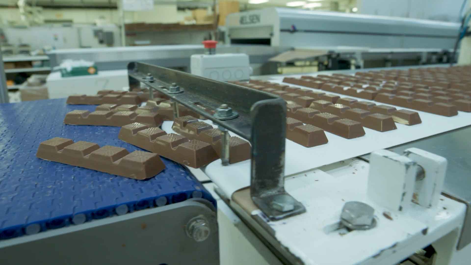 Chocolate on a conveyer belt.