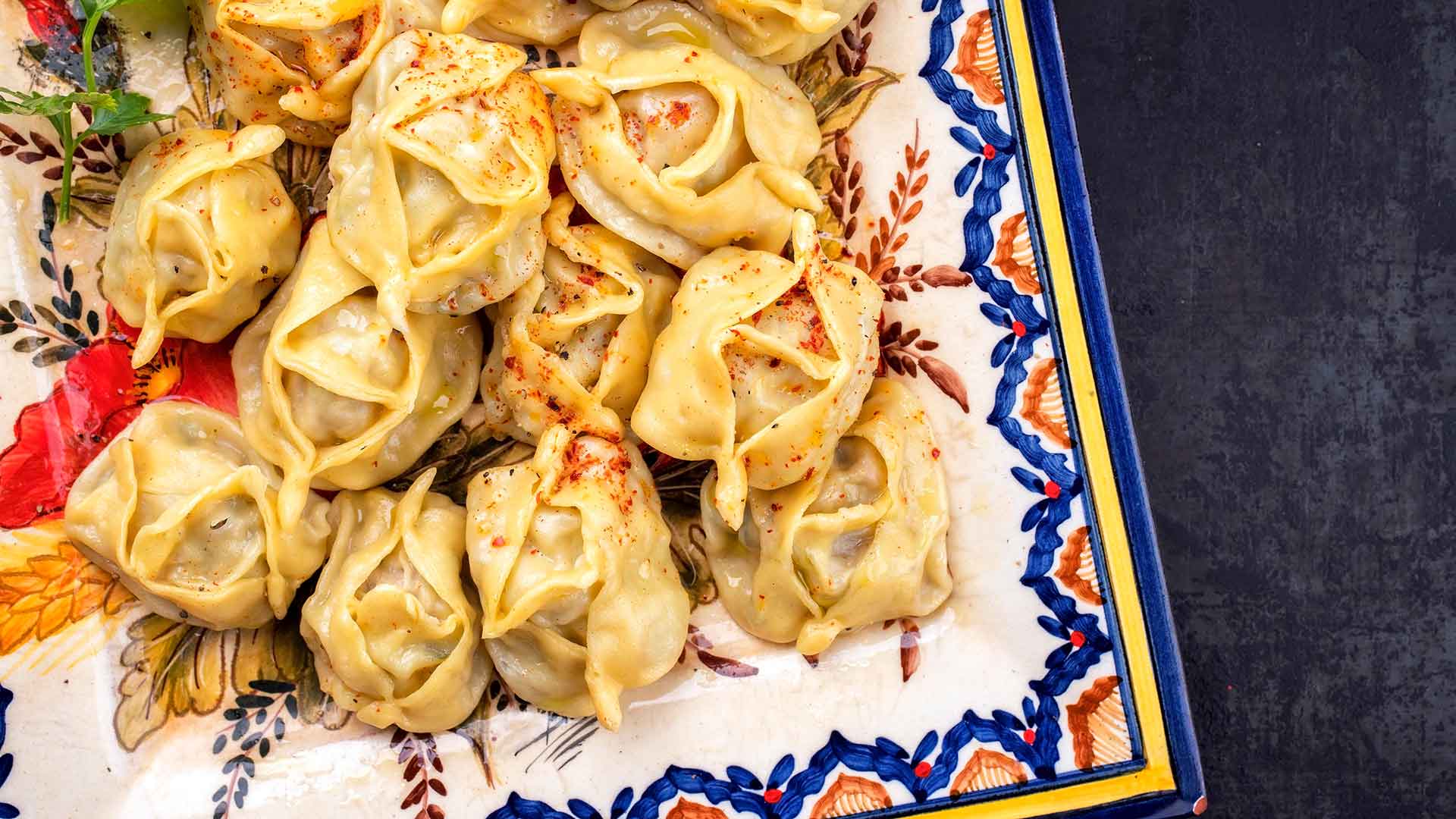 dumplings on a decorative plate.